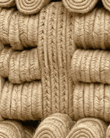 A close view of coiled natural-coloured rope soles.